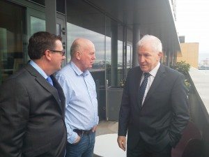 Minister for Arts, Heritage and the Gaeltacht, Jimmy Deenihan TD, with Gibson Hotel general manager, Adrian McLaughlin, and artist in residence John Morris at the artist in residence launch.