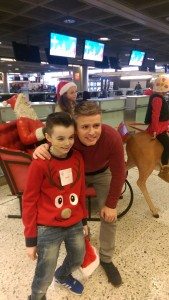 TV personality Brian Ormond with Charlie Maguire about to depart on the Cityjet/Temple Street Hospital Christmas flight